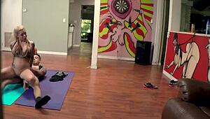 Karma experiences intense stretching by Bruno in yoga class