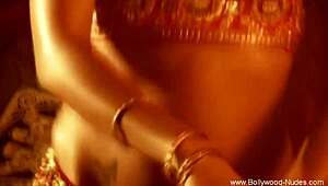 Sexy babe teases with erotic belly dancing alone. Her nude moves arouse in private.