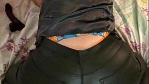 French amateur flaunts leather pants and satin lingerie in pov.