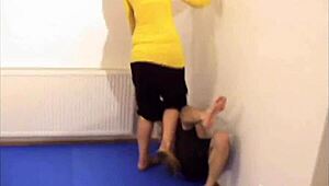 Fetish Femdom Mistress Torments Submissive with Harsh Domination Tactics.