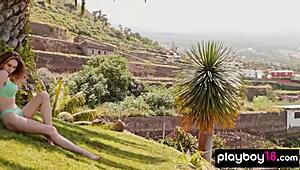 Big-boobed Ukrainian blondie Yana West strips and poses naked on the hillside.