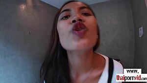 Asian teen gives her boyfriend a footjob.