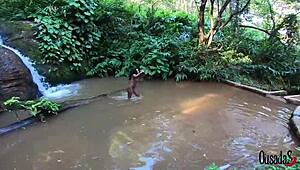 check out this ebony teen making hot outdoor content by the stream!