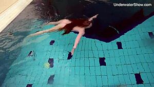 Simona is hot and horny in the public swimming pool