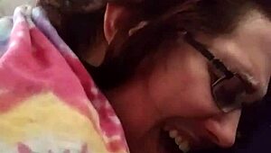 A hippie husband gives a fingering and anal sex to his nerdy wife