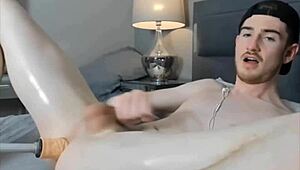 Watch this pale gay twink solo on webcam, cumming hard from his own ass play in a homemade orgasm session.