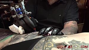 does marie bossette feel pain during leg tattoo?