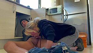 hot wife gives blowjob to plumber in kitchen, ends with cum in mouth