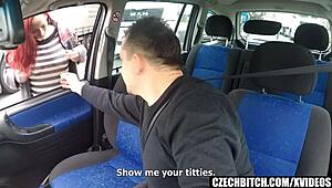 A red-haired woman without a hair gets hardcore sex in a car