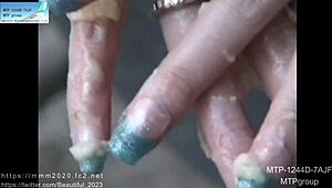 Japanese amateur shows NAILS MANICURE with artificial nails.