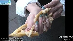 Japanese amateur shows NAILS MANICURE with artificial nails.