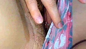 My little stepdaughter teases me while watching a movie together.