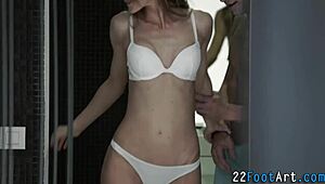 kinky babe works cock with feet in erotic session