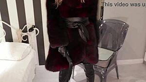 Mistress Otta in fur coat dominates with rough fingering and bdsm play.
