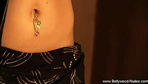 Watch this erotic brunette milf rip her clothes and dance nude!