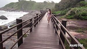 African Pornstar Masturbates Voyeuristically On The Beach