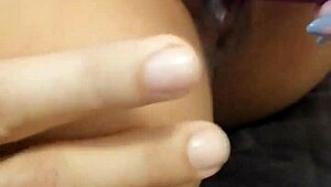 Close-up amateur video of a latina's anal masturbation