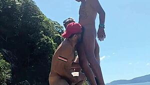 Native fishermen orgy on beach rocks