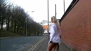 Slutty British amateur flashes her small tits in public