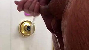 Jacking off hard in the steamy shower until bursting