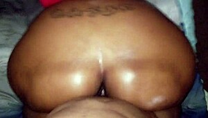 ebony babe with oiled big ass in sex scene