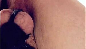 Teen Sissy in Chastity Stretches Hole with Homemade Toy for Wild Fun