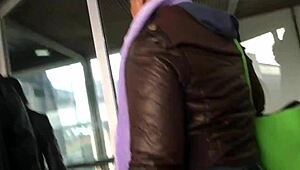 Spying on a chubby girl touching her brown nylon jacket on the street