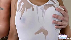 Hey, this flat Asian cutie from asianspanks.com is masturbating oiled and shaved, looking so petite and cute.