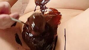 Japanese gay couple cooking chocolate banana in steamy scene