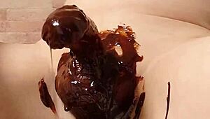 Japanese gay couple cooking chocolate banana in steamy scene