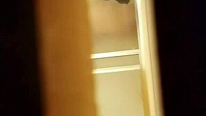 spying on a prostitute shaving her hairy pussy in secret.