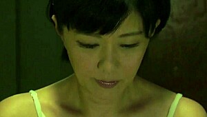 Japanese Mature Woman Indulges in Solo Play with Toys