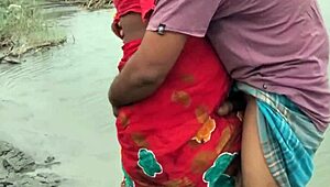 Indian couple gets wild with Bowdi bent over for hard fucking by the river.