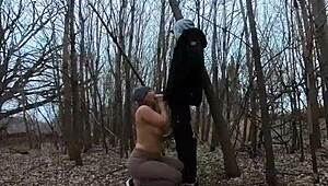 Topless thick girl sucks cock in the park with big tits