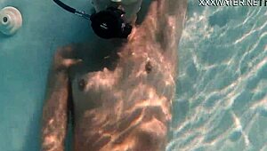 This naked petite 18+ brunette pornstar is masturbating while smoking, showing off her juicy tits and pussy.