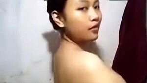 Young Khmer student enjoys a sensual shower with her lover