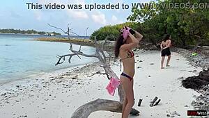 Golden shower for Katty right on the public beach