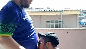 tbt eating young guy outdoors with audience watching.