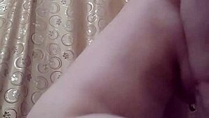 Amateur with big tits and shaved pussy performs wet private dance