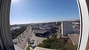 Sarada exposes big tits naked at hotel window near airport