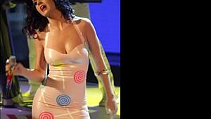 what’s hiding under Katy Perry’s skirt with huge milf curves?
