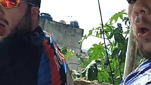 tbt eating young guy outdoors with audience watching.