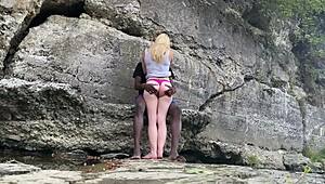 Bigdaddykj and his interracial couple enjoy outdoor fucking on a hike, their big black cocks dominating the scene