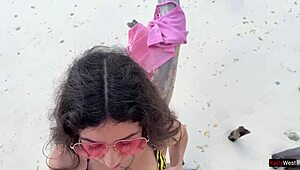 Golden shower for Katty right on the public beach