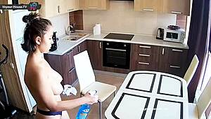 Is that big tits beauty cleaning the kitchen?