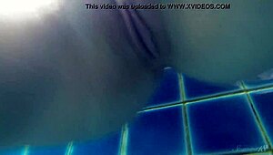 blonde pool babe wendy dives nude for a stunning underwater swim show