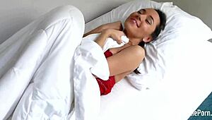 hey, watch this cute brunette messin’ with her toy!