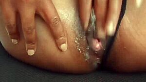 Horny milf fingering her wet pussy at work