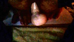 The sissy whore eagerly rides a thick dildo in stockings