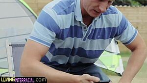 European model in group setting with big black partner